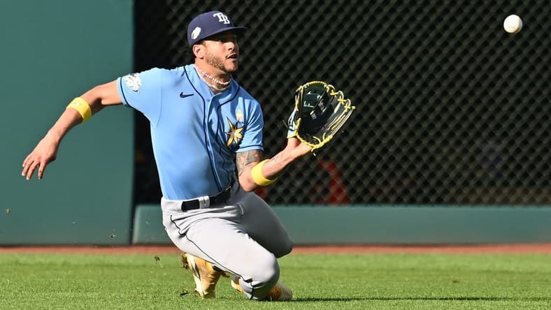 Sep 3, 2023; Cleveland, Ohio, USA; Tampa Bay Rays center fielder Jose Siri (22) catches a ball hit by Cleveland Guardians first baseman Kole Calhoun (not pictured) during the fifth inning at Progressive Field. Mandatory Credit: Ken Blaze-USA TODAY Sports