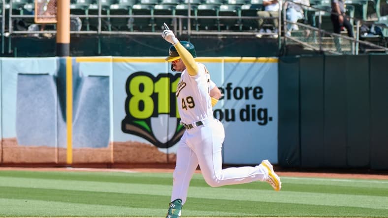 Sep 3, 2023; Oakland, California, USA; Oakland Athletics infielder Ryan Noda (49) reacts while running the bases after hitting a two run home run against the Los Angeles Angels during the sixth inning at Oakland-Alameda County Coliseum. Mandatory Credit: Robert Edwards-USA TODAY Sports