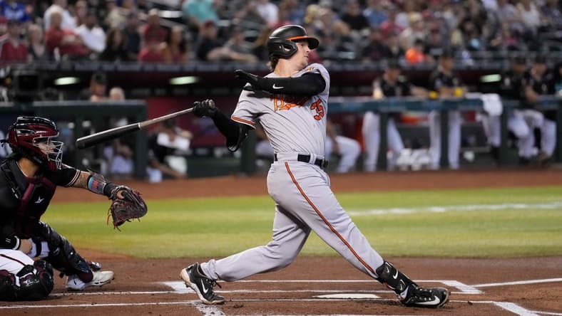 Sep 3, 2023; Phoenix, Arizona, USA; Baltimore Orioles catcher Adley Rutschman (35) bats against the Arizona Diamondbacks at Chase Field. Mandatory Credit: Joe Camporeale-USA TODAY Sports