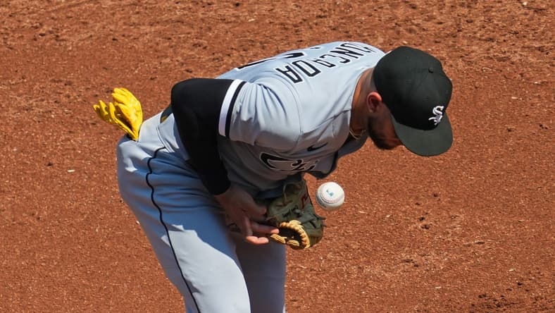 Sep 4, 2023; Kansas City, Missouri, USA; Chicago White Sox third baseman Yoan Moncada (10) bobbles a ground ball during the second inning against the Kansas City Royals at Kauffman Stadium. Mandatory Credit: Jay Biggerstaff-USA TODAY Sports