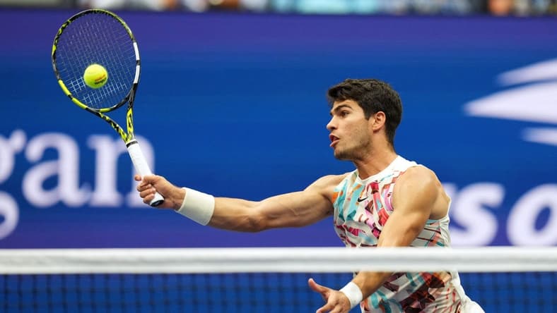 Sep 4, 2023; Flushing, NY, USA; Carlos Alcaraz of Spain hits to Matteo Arnaldi of Italy on day eight of the 2023 U.S. Open tennis tournament at USTA Billie Jean King National Tennis Center. Mandatory Credit: Danielle Parhizkaran-USA TODAY Sports