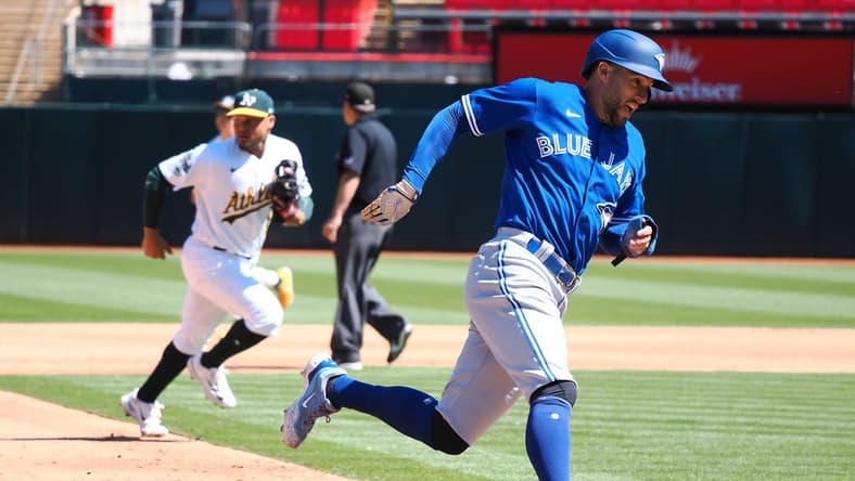 Sep 4, 2023; Oakland, California, USA; Toronto Blue Jays right fielder George Springer (4) rounds third base for a run against the Oakland Athletics during the fifth inning at Oakland-Alameda County Coliseum. Mandatory Credit: Kelley L Cox-USA TODAY Sports