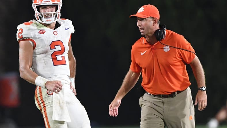 Sep 4, 2023; Durham, North Carolina, USA; Clemson Tigers quarterback Cade Klubnik (2)  talks with head coach Dabo Swinney during the fourth quarter of the season opening game at Wallace Wade Stadium in Durham, N.C. Mandatory Credit: Ken Ruinard-USA TODAY Sports