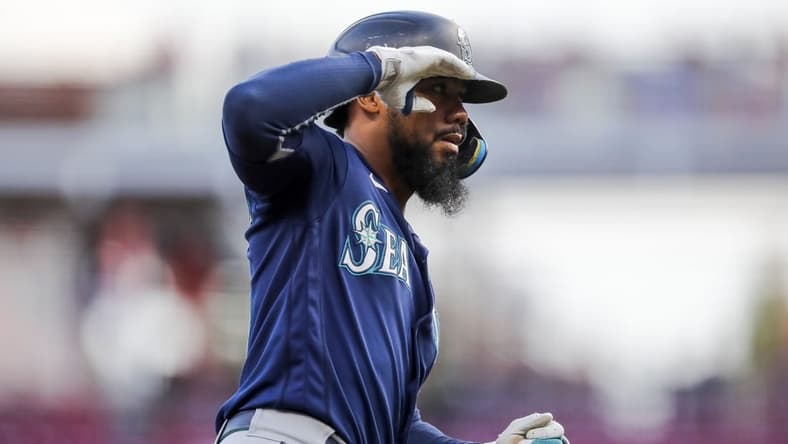 Sep 5, 2023; Cincinnati, Ohio, USA; Seattle Mariners right fielder Teoscar Hernandez (35) reacts after hitting a two-run home run in the first inning against the Cincinnati Reds at Great American Ball Park. Mandatory Credit: Katie Stratman-USA TODAY Sports