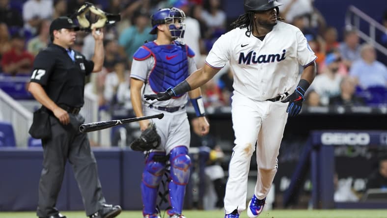 Sep 5, 2023; Miami, Florida, USA; Miami Marlins first baseman Josh Bell (9) looks on after hitting a two-run home run against the Los Angeles Dodgers during the fifth inning at loanDepot Park. Mandatory Credit: Sam Navarro-USA TODAY Sports