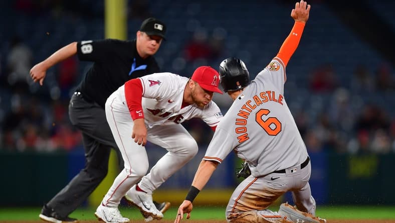 Sep 5, 2023; Anaheim, California, USA;  Baltimore Orioles first baseman Ryan Mountcastle (6) is out at second by Los Angeles Angels second baseman Brandon Drury (23) during the third inning at Angel Stadium. Mandatory Credit: Gary A. Vasquez-USA TODAY Sports