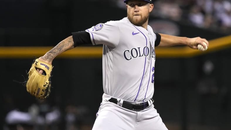 Sep 5, 2023; Phoenix, Arizona, USA; Colorado Rockies starting pitcher Kyle Freeland (21) throws against the Arizona Diamondbacks in the first inning at Chase Field. Mandatory Credit: Rick Scuteri-USA TODAY Sports