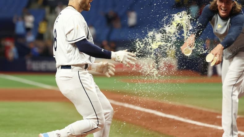Sep 5, 2023; St. Petersburg, Florida, USA; Tampa Bay Rays second baseman Brandon Lowe (8) celebrates after he hit a three run walk off home run during the eleventh inning against the Boston Red Sox  at Tropicana Field. Mandatory Credit: Kim Klement Neitzel-USA TODAY Sports