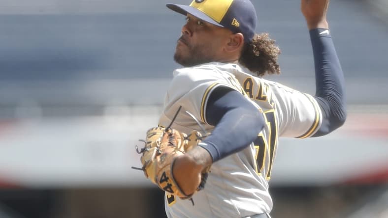 Sep 6, 2023; Pittsburgh, Pennsylvania, USA;  Milwaukee Brewers starting pitcher Freddy Peralta (51) delivers a pitch against the Pittsburgh Pirates during the first inning at PNC Park. Mandatory Credit: Charles LeClaire-USA TODAY Sports
