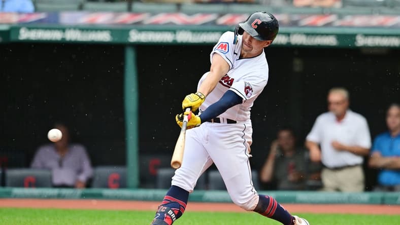 Sep 6, 2023; Cleveland, Ohio, USA; Cleveland Guardians left fielder Will Brennan (17) hits an RBI double during the fourth inning against the Minnesota Twins at Progressive Field. Mandatory Credit: Ken Blaze-USA TODAY Sports