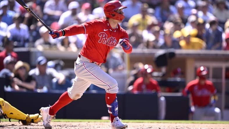 Sep 6, 2023; San Diego, California, USA; Philadelphia Phillies first baseman Bryce Harper (3) hits a two-RBI double against the San Diego Padres during the fourth inning at Petco Park. Mandatory Credit: Orlando Ramirez-USA TODAY Sports