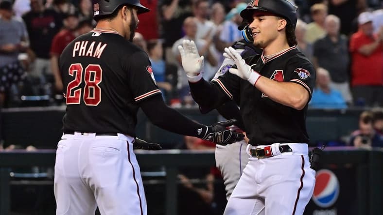 Sep 6, 2023; Phoenix, Arizona, USA; Arizona Diamondbacks center fielder Alek Thomas (5) celebrates with left fielder Tommy Pham (28) after hitting a three run home run in the third inning against the Colorado Rockies at Chase Field. Mandatory Credit: Matt Kartozian-USA TODAY Sports