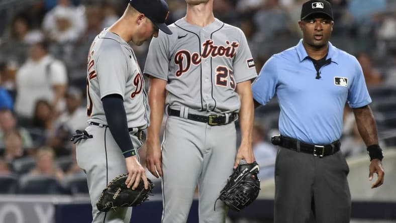 Sep 6, 2023; Bronx, New York, USA;  Detroit Tigers first baseman Spencer Torkelson (20) checks on starting pitcher Matt Manning (25) after he was hit by a line drive in the first inning against the New York Yankees at Yankee Stadium. Mandatory Credit: Wendell Cruz-USA TODAY Sports