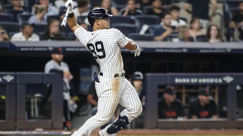 Sep 6, 2023; Bronx, New York, USA;  New York Yankees center fielder Jasson Dominguez (89) hits a single in the sixth inning against the Detroit Tigers at Yankee Stadium. Mandatory Credit: Wendell Cruz-USA TODAY Sports