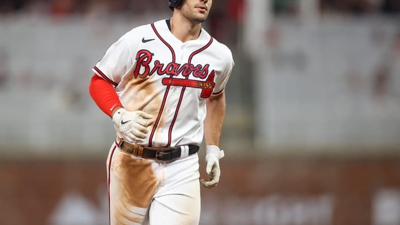Sep 7, 2023; Atlanta, Georgia, USA; Atlanta Braves first baseman Matt Olson (28) hits a home run against the St. Louis Cardinals in the fifth inning at Truist Park. Mandatory Credit: Brett Davis-USA TODAY Sports