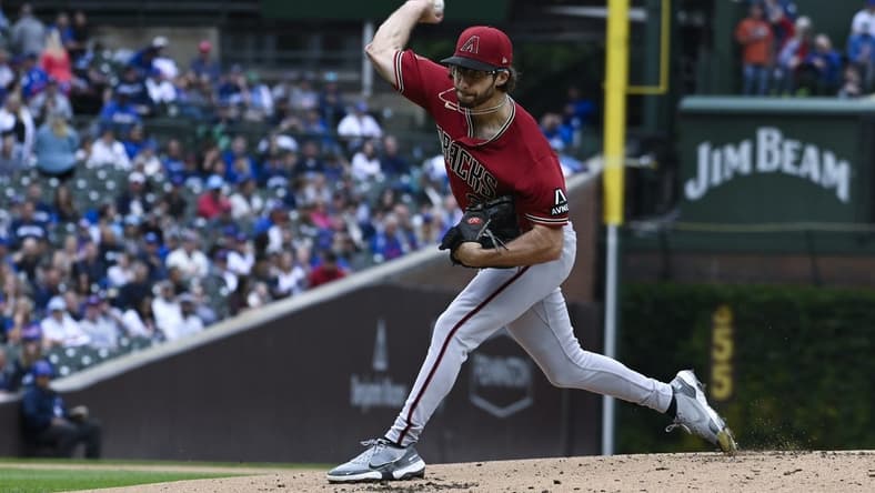 Sep 8, 2023; Chicago, Illinois, USA;  Arizona Diamondbacks starting pitcher Zac Gallen (23) delivers a pitch against the Chicago Cubs during the first inning at Wrigley Field. Mandatory Credit: Matt Marton-USA TODAY Sports