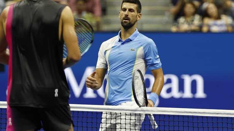 Sep 8, 2023; Flushing, NY, USA; Novak Djokovic of Serbia shakes hands with Ben Shelton of the United States (L) after their match in a men's singles semifinal on day twelve of the 2023 U.S. Open tennis tournament at USTA Billie Jean King Tennis Center. Mandatory Credit: Geoff Burke-USA TODAY Sports