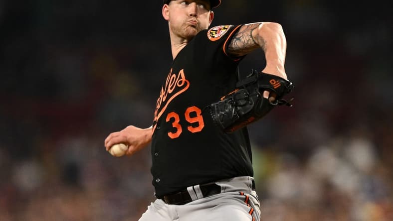 Sep 8, 2023; Boston, Massachusetts, USA; Baltimore Orioles starting pitcher Kyle Bradish (39) pitches against the Boston Red Sox during the first inning at Fenway Park. Mandatory Credit: Brian Fluharty-USA TODAY Sports
