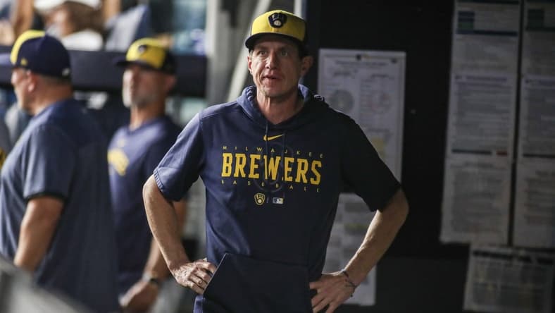 Sep 8, 2023; Bronx, New York, USA; Milwaukee Brewers manager Craig Counsell (30) looks out from the dugout in the first inning against the New York Yankees at Yankee Stadium. Mandatory Credit: Wendell Cruz-USA TODAY Sports