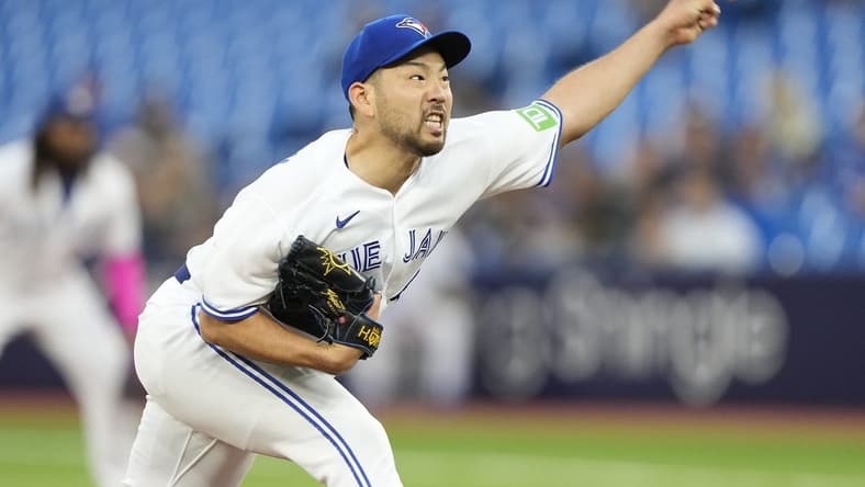 Sep 8, 2023; Toronto, Ontario, CAN; Toronto Blue Jays starting pitcher Yusei Kikuchi (16) pitches to the Kansas City Royals during the second inning at Rogers Centre. Mandatory Credit: John E. Sokolowski-USA TODAY Sports