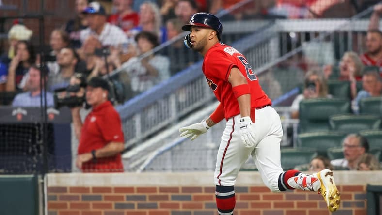 Sep 8, 2023; Atlanta, Georgia, USA; Atlanta Braves left fielder Eddie Rosario (8) hits a RBI single against the Pittsburgh Pirates in the third inning at Truist Park. Mandatory Credit: Brett Davis-USA TODAY Sports