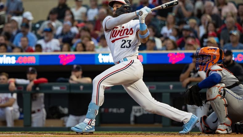 Sep 8, 2023; Minneapolis, Minnesota, USA; Minnesota Twins third baseman Royce Lewis (23) hits a RBI double during the first inning against the New York Mets at Target Field. Mandatory Credit: Jordan Johnson-USA TODAY Sports