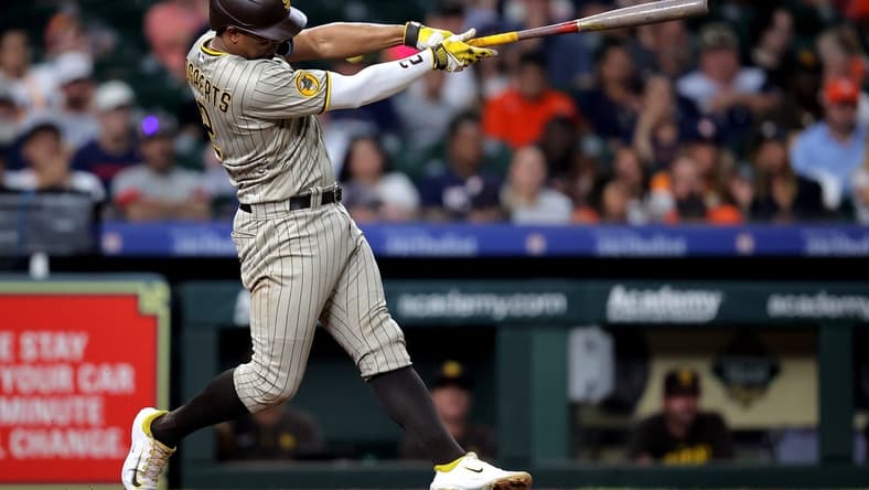 Sep 8, 2023; Houston, Texas, USA; San Diego Padres shortstop Xander Bogaerts (2) hits a home run to left field against the Houston Astros during the third inning at Minute Maid Park. Mandatory Credit: Erik Williams-USA TODAY Sports