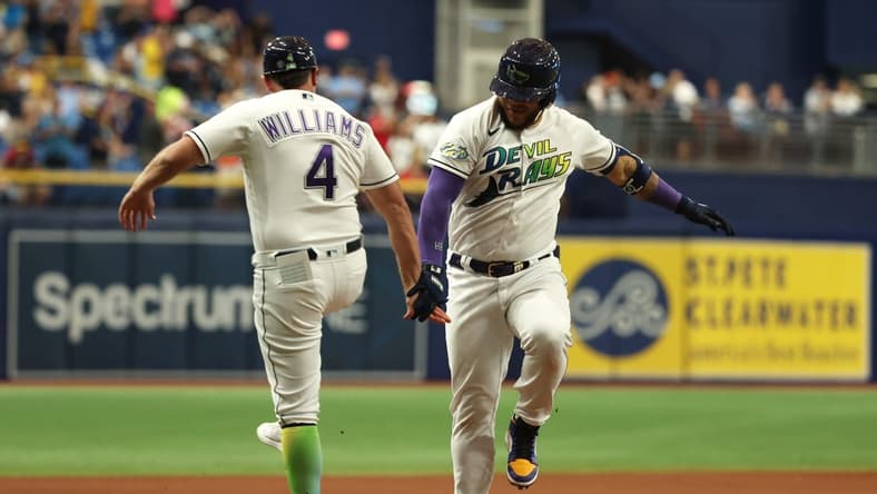Sep 8, 2023; St. Petersburg, Florida, USA;Tampa Bay Rays designated hitter Harold Ramirez (43) hits a 2-run home run during the seventh inning against the Seattle Mariners  at Tropicana Field. Mandatory Credit: Kim Klement Neitzel-USA TODAY Sports