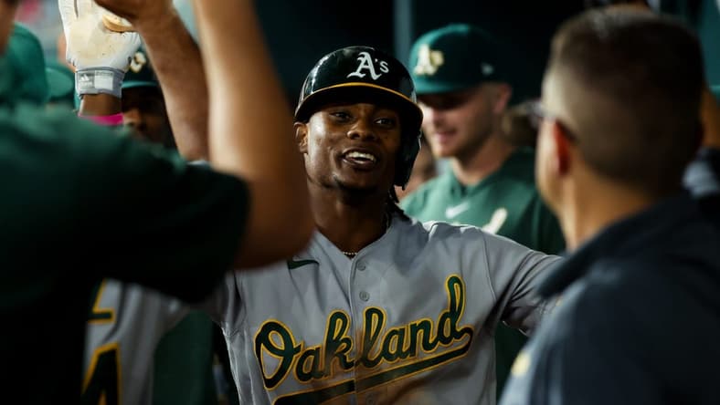 Sep 8, 2023; Arlington, Texas, USA; Oakland Athletics center fielder Esteury Ruiz (1) celebrates with teammates after hitting a home run during the fifth inning against the Texas Rangers at Globe Life Field. Mandatory Credit: Kevin Jairaj-USA TODAY Sports