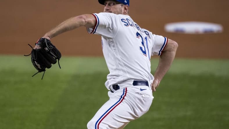 Sep 6, 2023; Arlington, Texas, USA; Texas Rangers starting pitcher Max Scherzer (31) in action during the game between the Texas Rangers and the Houston Astros at Globe Life Field. Mandatory Credit: Jerome Miron-USA TODAY Sports