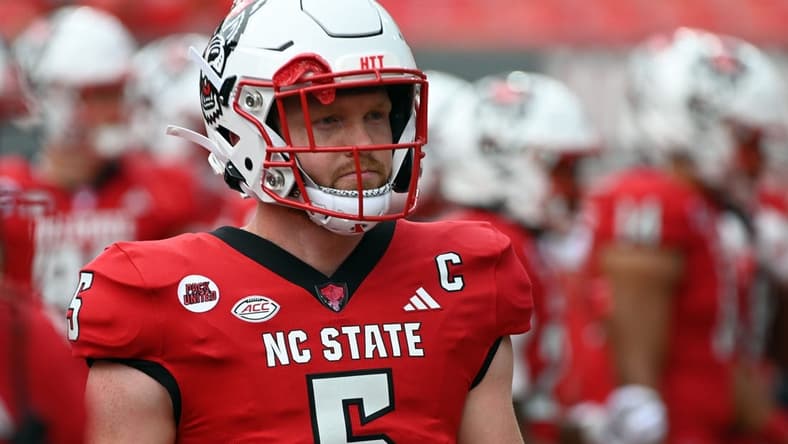 Sep 9, 2023; Raleigh, North Carolina, USA;  North Carolina State Wolfpack quarterback Brennan Armstrong (5) warms up prior to a game against the Notre Dame Fighting Irish at Carter-Finley Stadium. Mandatory Credit: Rob Kinnan-USA TODAY Sports
