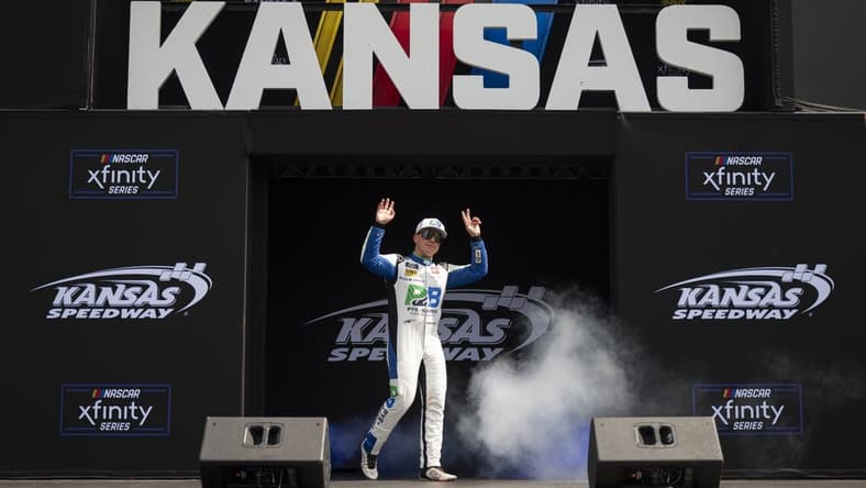 Sep 9, 2023; Kansas City, Kansas, USA; NASCAR Xfinity Series driver John Hunter Nemechek (20) is introduced before the Xfinity Series Kansas Lottery 300 at Kansas Speedway. Mandatory Credit: Amy Kontras-USA TODAY Sports