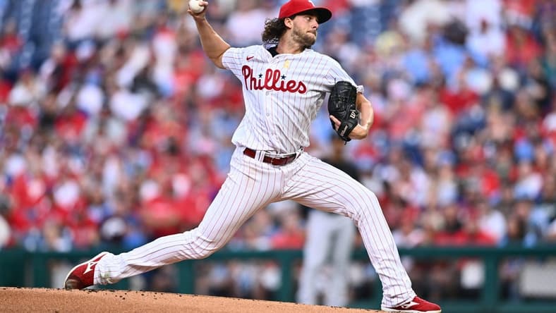 Sep 9, 2023; Philadelphia, Pennsylvania, USA; Philadelphia Phillies starting pitcher Aaron Nola (27) throws a pitch against the Miami Marlins in the first inning at Citizens Bank Park. Mandatory Credit: Kyle Ross-USA TODAY Sports