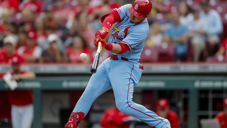 Sep 9, 2023; Cincinnati, Ohio, USA; St. Louis Cardinals third baseman Nolan Gorman (16) hits a single against the Cincinnati Reds in the first inning at Great American Ball Park. Mandatory Credit: Katie Stratman-USA TODAY Sports
