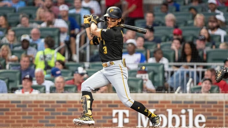 Sep 9, 2023; Cumberland, Georgia, USA; Pittsburgh Pirates second baseman Ji Hwan Bae (3) hits single against Atlanta Braves at Truist Park. Mandatory Credit: Jordan Godfree-USA TODAY Sports