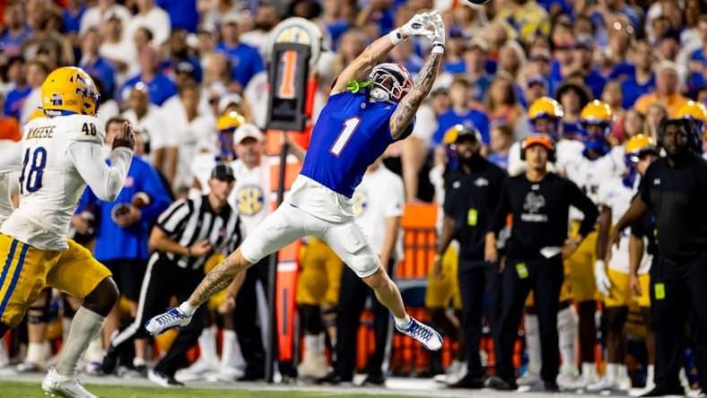 Sep 9, 2023; Gainesville, Florida, USA; Florida Gators wide receiver Ricky Pearsall (1) misses a catch as McNeese State Cowboys linebacker Micah Davey (48) runs to defend during the first half at Ben Hill Griffin Stadium. Mandatory Credit: Matt Pendleton-USA TODAY Sports