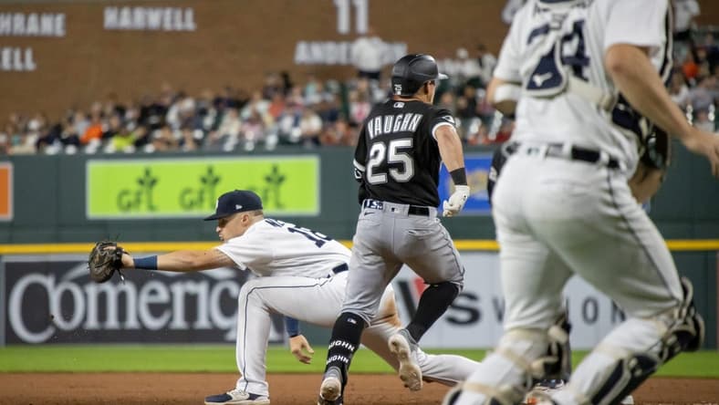 Sep 9, 2023; Detroit, Michigan, USA; Detroit Tigers first baseman Spencer Torkelson (20) catches the ball for an out on Chicago White Sox first baseman Andrew Vaughn (25) in the eighth inning at Comerica Park. Mandatory Credit: David Reginek-USA TODAY Sports