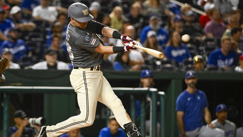Sep 9, 2023; Washington, District of Columbia, USA; Washington Nationals designated hitter Lane Thomas (28) hits a two run home run against the Los Angeles Dodgers during the seventh inning at Nationals Park. Mandatory Credit: Brad Mills-USA TODAY Sports