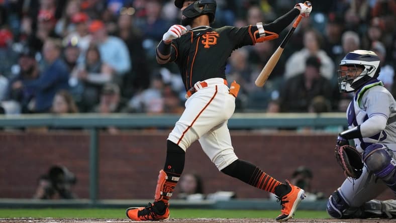 Sep 9, 2023; San Francisco, California, USA; San Francisco Giants center fielder Luis Matos (29) hits an RBI single against the Colorado Rockies during the fourth inning at Oracle Park. Mandatory Credit: Darren Yamashita-USA TODAY Sports