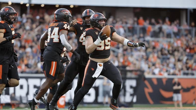 Sep 9, 2023; Corvallis, Oregon, USA; Oregon State Beavers defensive lineman Isaac Hodgins (99) celebrates after recovering a fumble against the UC Davis Aggies during the first half at Reser Stadium. Mandatory Credit: Soobum Im-USA TODAY Sports