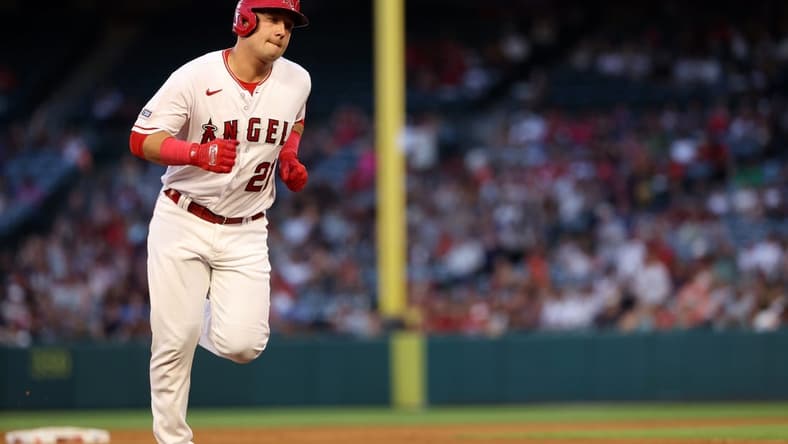 Sep 9, 2023; Anaheim, California, USA;  Los Angeles Angels designated hitter Matt Thaiss (21) hits a home run during the fourth inning against the Cleveland Guardians at Angel Stadium. Mandatory Credit: Kiyoshi Mio-USA TODAY Sports