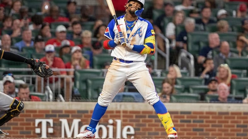 Sep 9, 2023; Cumberland, Georgia, USA; Atlanta Braves right fielder Ronald Acuna Jr. (13) reacts to pitch from Pittsburgh Pirates during fifth inning at Truist Park. Mandatory Credit: Jordan Godfree-USA TODAY Sports