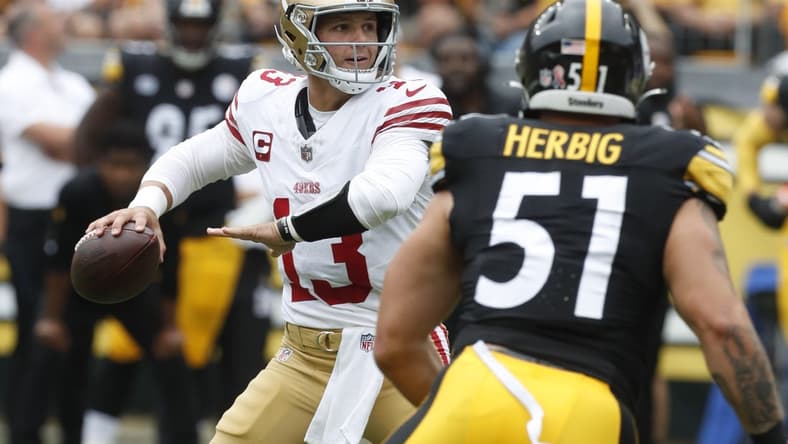 Sep 10, 2023; Pittsburgh, Pennsylvania, USA;  San Francisco 49ers quarterback Brock Purdy (13) passes against the Pittsburgh Steelers during the first quarter at Acrisure Stadium. Mandatory Credit: Charles LeClaire-USA TODAY Sports