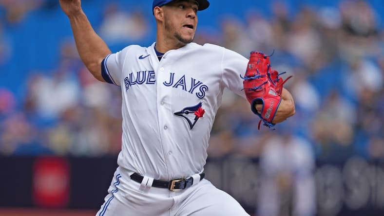 Sep 10, 2023; Toronto, Ontario, CAN; Toronto Blue Jays starting pitcher Jose Berrios (17) throws a pitch against the Kansas City Royals during the first inning at Rogers Centre. Mandatory Credit: Nick Turchiaro-USA TODAY Sports