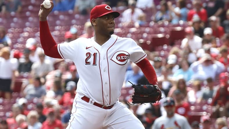 Sep 10, 2023; Cincinnati, Ohio, USA; Cincinnati Reds starting pitcher Hunter Greene (21) throws against the St. Louis Cardinals during the first inning at Great American Ball Park. Mandatory Credit: David Kohl-USA TODAY Sports