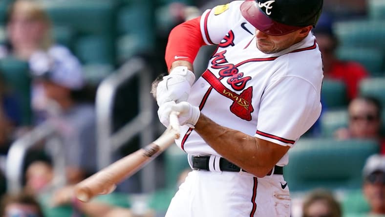 Sep 10, 2023; Cumberland, Georgia, USA; Atlanta Braves first baseman Matt Olson (28) breaks his bat against the Pittsburgh Pirates during the sixth inning at Truist Park. Mandatory Credit: John David Mercer-USA TODAY Sports