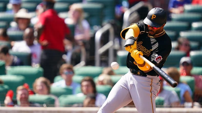 Sep 10, 2023; Cumberland, Georgia, USA; Pittsburgh Pirates right fielder Joshua Palacios (54) hits a triple against the Atlanta Braves during the seventh inning at Truist Park. Mandatory Credit: John David Mercer-USA TODAY Sports