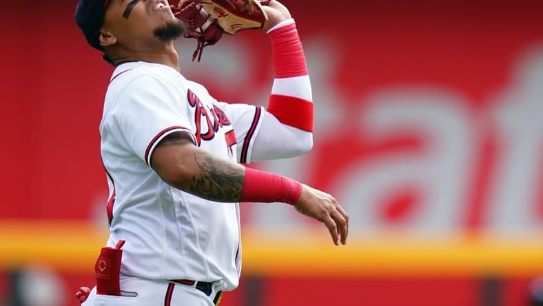 Sep 10, 2023; Cumberland, Georgia, USA; Atlanta Braves shortstop Orlando Arcia (11) catches a pop fly for an out against the Pittsburgh Pirates during the seventh inning at Truist Park. Mandatory Credit: John David Mercer-USA TODAY Sports