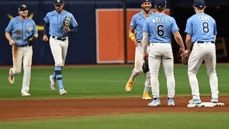 Sep 10, 2023; St. Petersburg, Florida, USA; Members of the Tampa Bay Rays celebrate after defeating the Seattle Mariners at Tropicana Field. Mandatory Credit: Jonathan Dyer-USA TODAY Sports