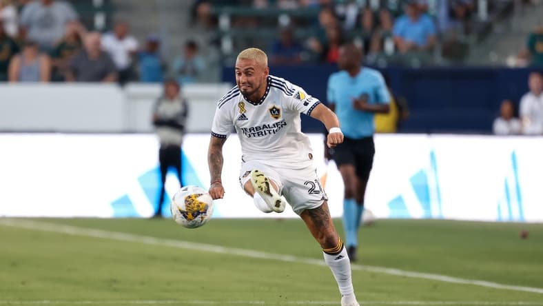 Sep 10, 2023; Carson, California, USA; Los Angeles Galaxy midfielder Diego Fagundez (21) fields the ball in the second half against St. Louis CITY SC at Dignity Health Sports Park. Mandatory Credit: Kiyoshi Mio-USA TODAY Sports